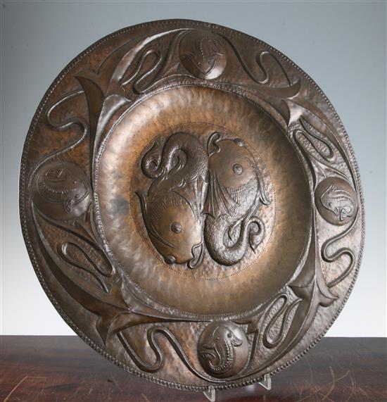 A John Pearson Arts & Crafts circular copper charger, 20in.